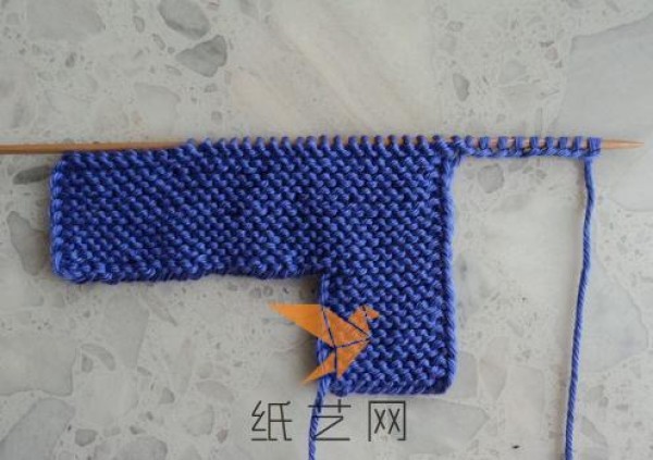 Tutorial on making woolen home shoes with stick knitting