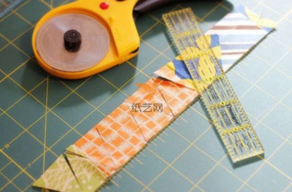 Fabric tutorial for wrapping decorative ribbons with floral pennants