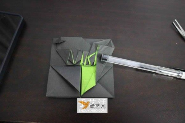 How to fold the Nike logo using origami