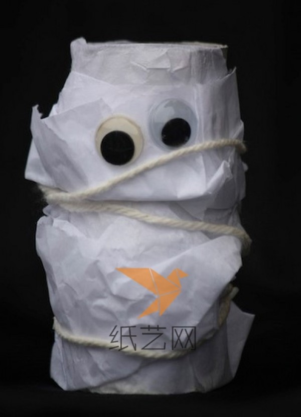 Childrens handicrafts turn waste into treasure by transforming old paper tubes into Halloween mummies