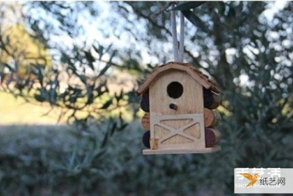 Use red wine bottle corks to make a cute dollhouse birdcage