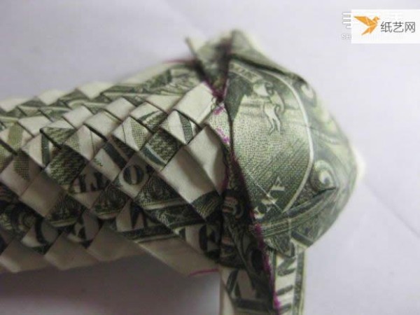 How to fold paper carp using dollars