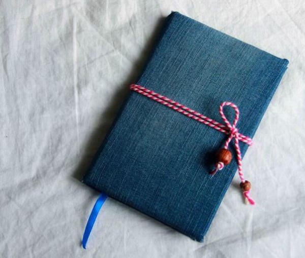 DIY tutorial on using old jeans to make textured book covers