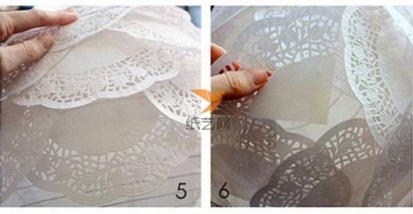 A beautiful lantern made of paper art hollow lace dessert paper mat