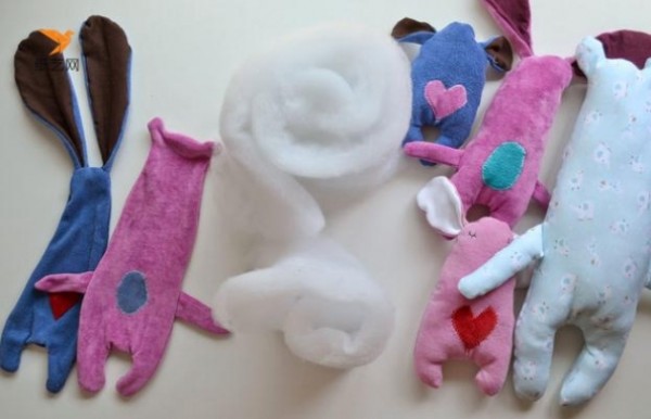 Tutorial on how to make cute little dolls by using old clothes from waste.