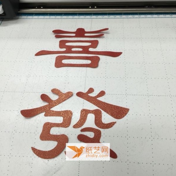 Tutorial on making paper-cut Gong Xi Fa Cai ornaments