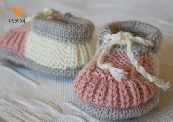 Illustration of hand-knitted baby woolen shoes