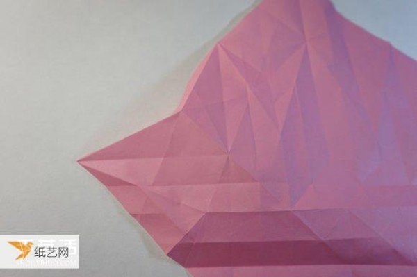 Illustrated step-by-step tutorial for girls using origami to fold something that looks complicated