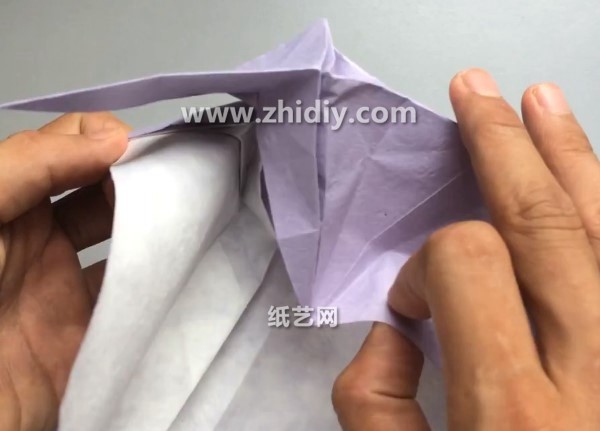 Three-dimensional origami creative production tutorial of handmade origami dolphin