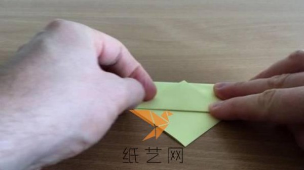 A step-by-step tutorial on how to make an origami peace dove