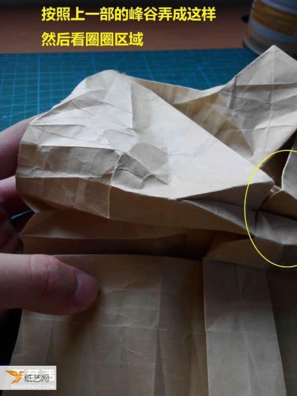 Detailed step-by-step illustration of using origami to fold a complex three-dimensional rabbit head