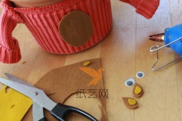 Turn waste into treasure by transforming old sweaters into small Christmas flower pot decorations