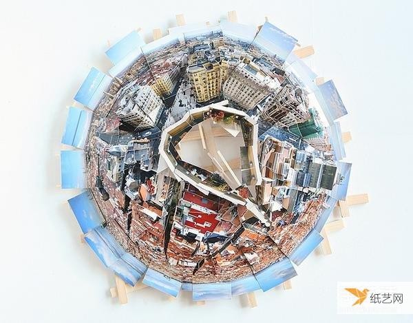 Three-dimensional city paper sculpture art: splicing multiple photos into a panoramic picture