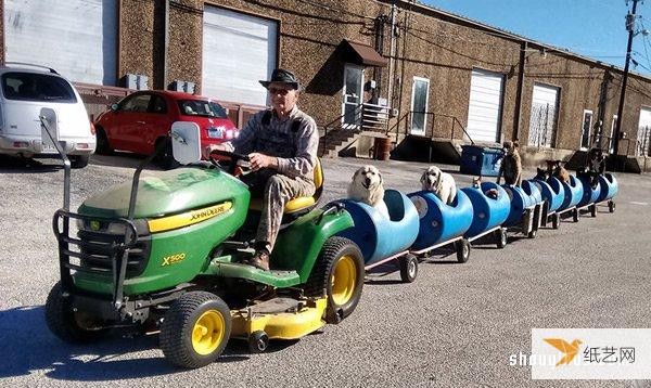 80-year-old man builds dog train to take adopted stray dogs for a ride