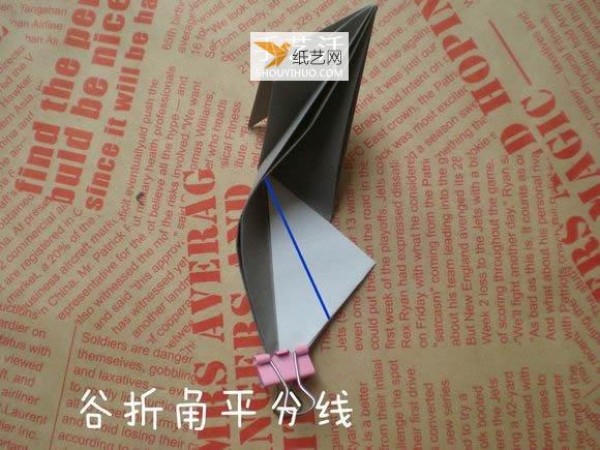 Illustration of hand folding cute puppy using origami