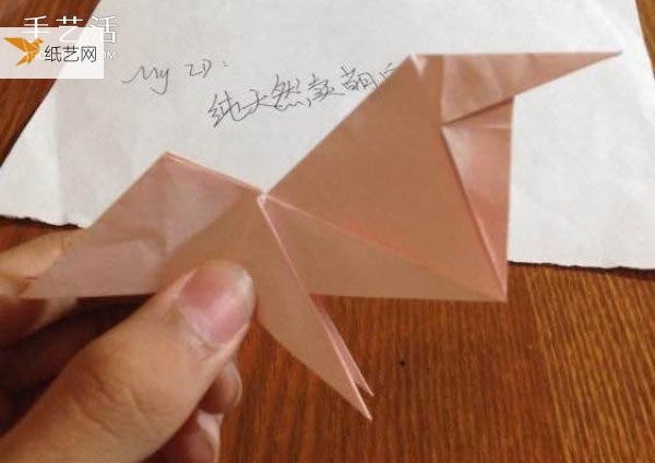 Illustration of how to fold a three-dimensional poodle using origami