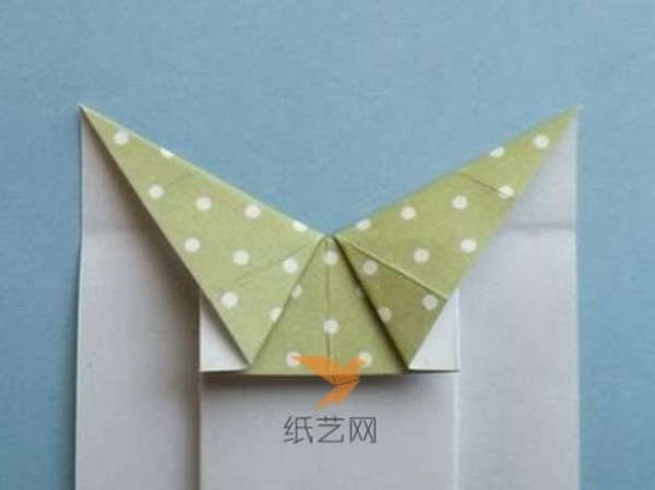 Illustrated tutorial on how to fold an origami skirt on a handmade greeting card