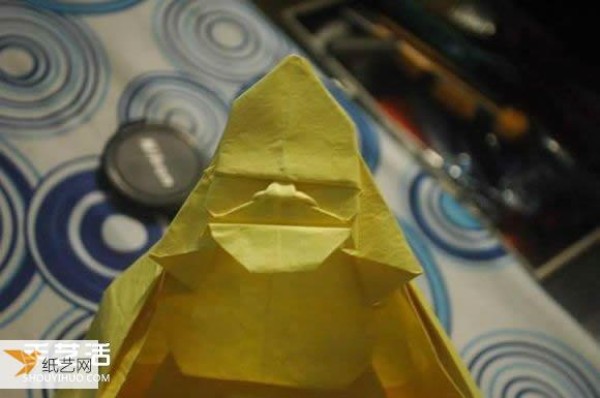 Illustrated tutorial on how to fold paper Maitreya Buddha