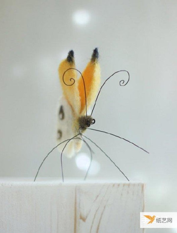 Appreciate the pictures of beautiful realistic and natural butterflies made of wool felt that look like living creatures