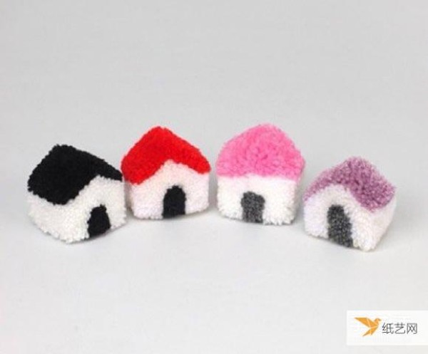 Tutorial on how to make a cute little house using yarn balls