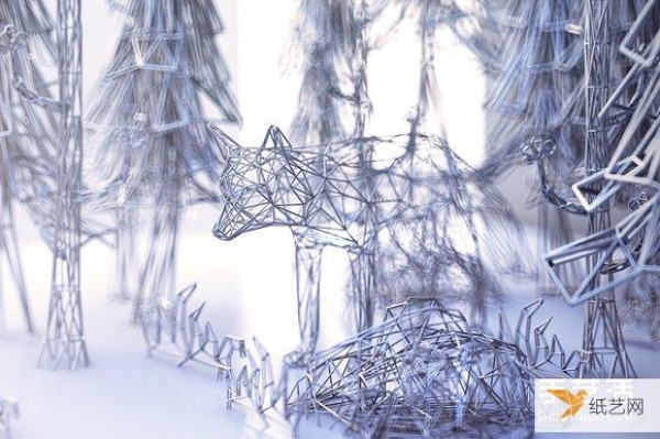 Handmade gold-coated silver wire sculptures entwine the elegant soul of animals