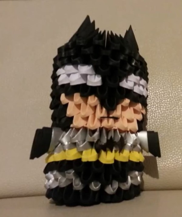 Origami tutorial for cartoon origami triangle with Batman