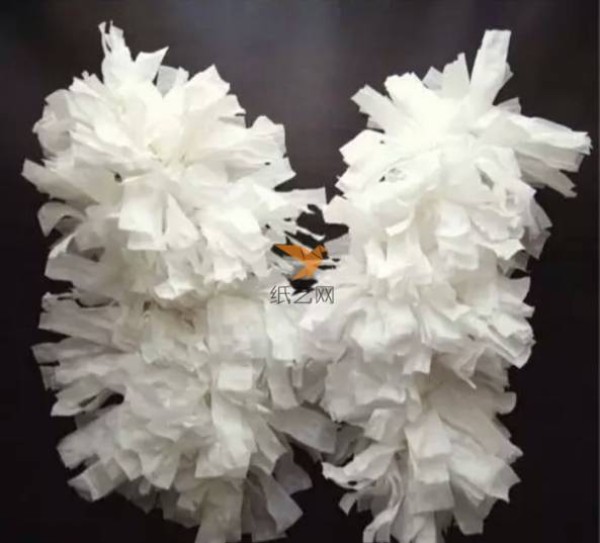 Turn waste into treasure. How to make angel wings made from clothes hangers and paper towels.