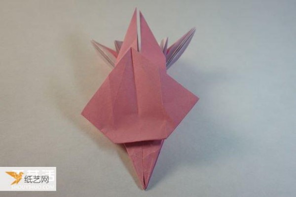 Illustrated step-by-step tutorial for girls using origami to fold something that looks complicated