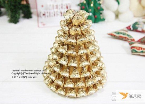 A personalized and super festive Christmas tree made entirely of chocolate