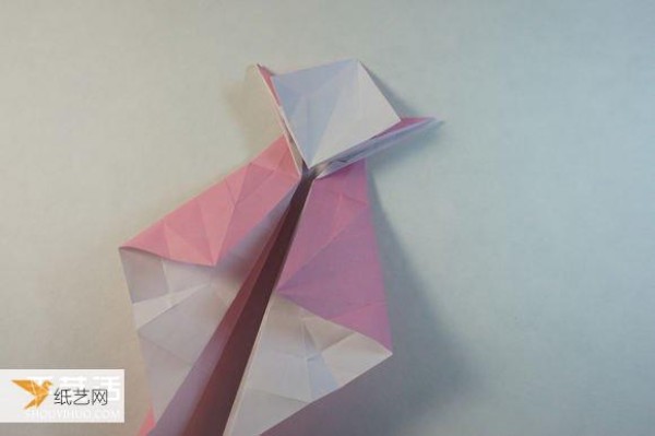 Illustrated step-by-step tutorial for girls using origami to fold something that looks complicated