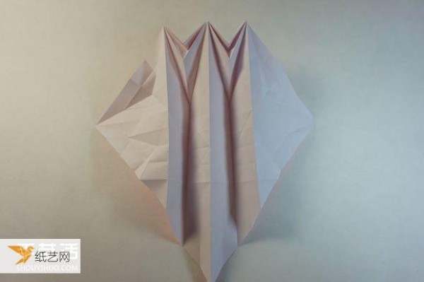 Illustrated step-by-step tutorial for girls using origami to fold something that looks complicated