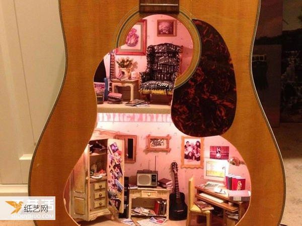 A dollhouse transformed from an old guitar as a 25th birthday gift for my daughter