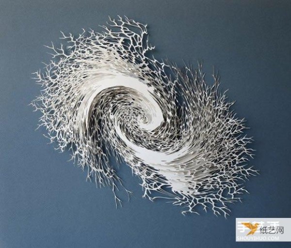 Three-dimensional paper sculptures created using bacterial crystals as inspiration