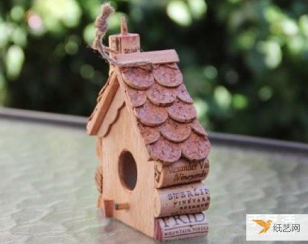 Use red wine bottle corks to make a cute dollhouse birdcage