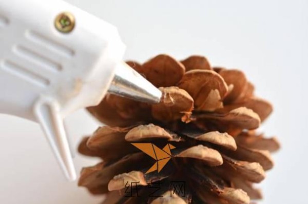 Girly Christmas tree decorations made by turning waste into treasures from pine cones