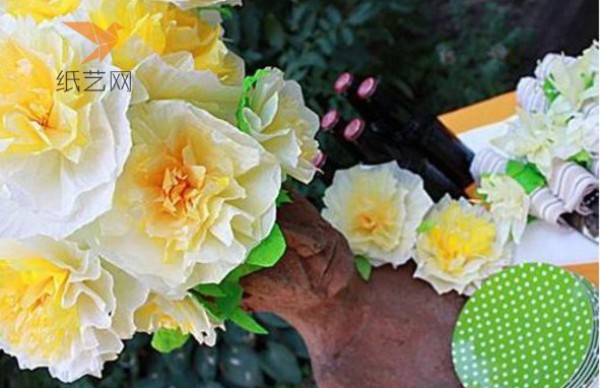 Paper art tutorial teaches you step by step how to make paper peony flowers.