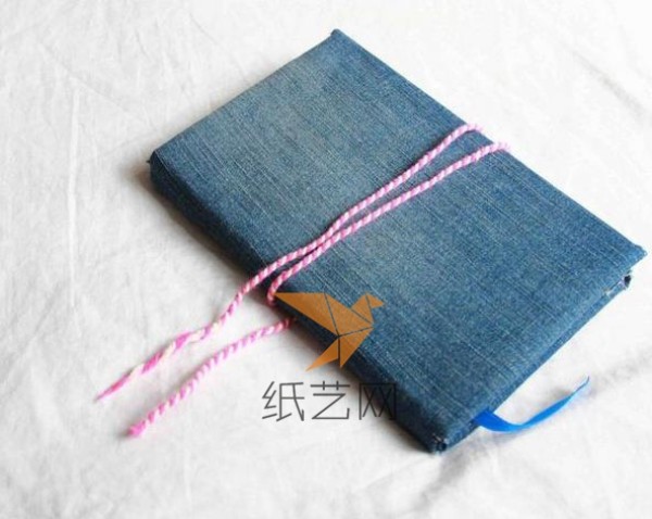 DIY tutorial on using old jeans to make textured book covers