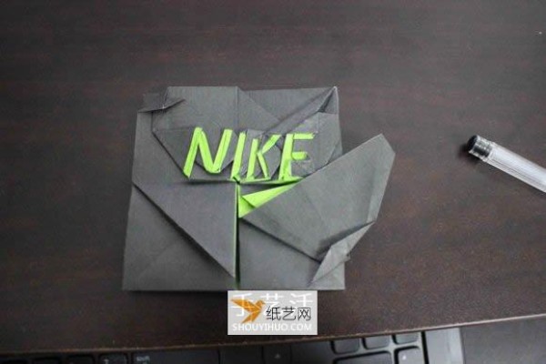 How to fold the Nike logo using origami