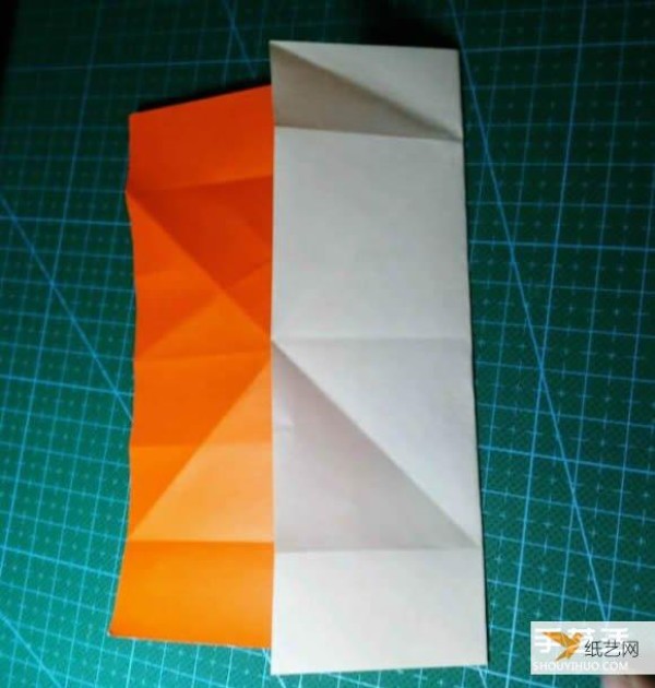 Detailed explanation of the manual method of folding a paper kingfisher tutorial.