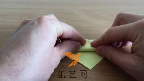 A step-by-step tutorial on how to make an origami peace dove