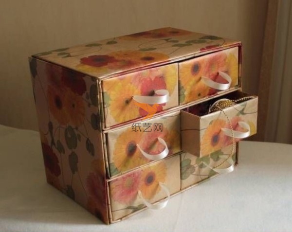 Turn waste into treasure. Beautiful storage cabinet made of cardboard boxes. Tutorial on turning waste into treasure.