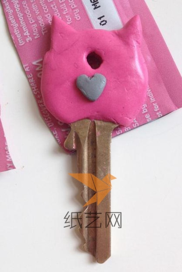 Kitten shaped key decoration made from clay