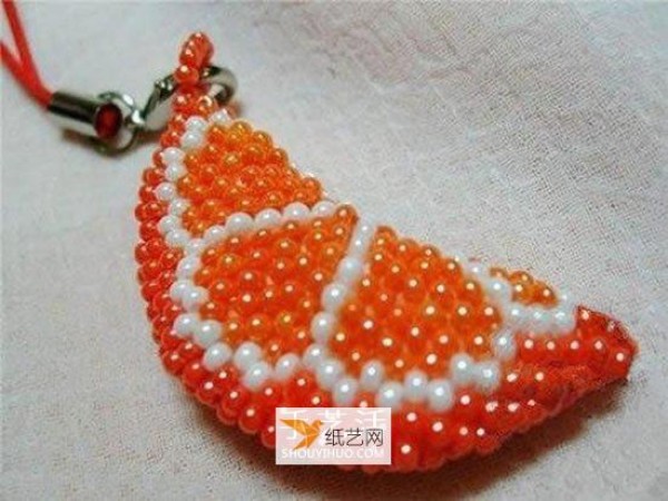 Use beads to create a personalized orange petal keychain