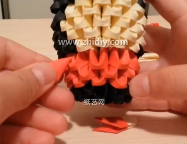 How to make an origami triangle Chinese doll