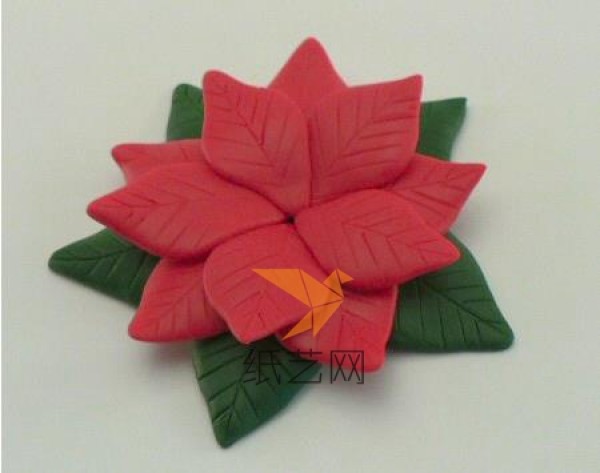 Adorable DIY tutorial for making Christmas flowers from super light clay