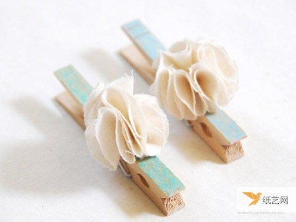 Looks like a very simple and creative handmade wooden clip work