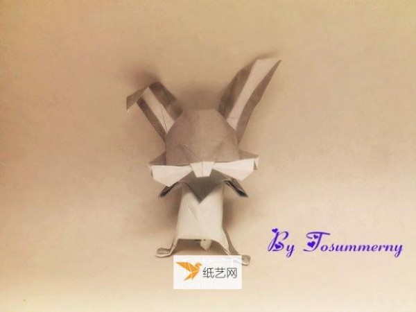 Illustration of how to prepare origami to fold Bugs Bunny