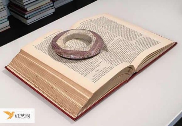 Jewelry with a taste of time made from old books and newspapers