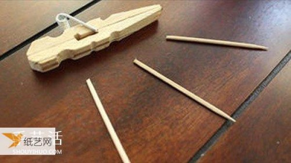 Use wooden clips to make your own personalized toy gun