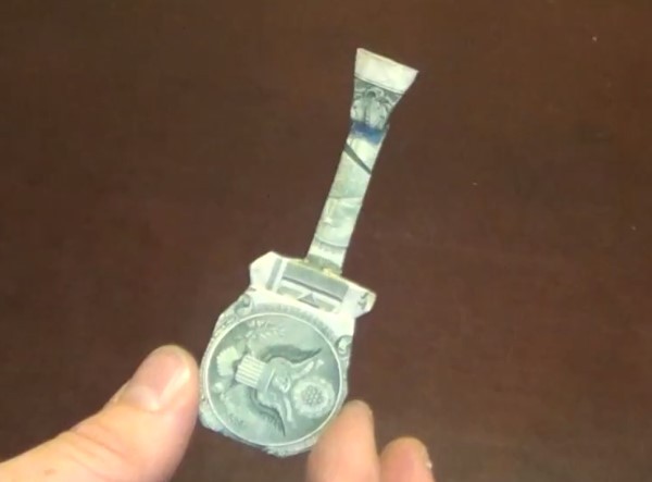 Video tutorial on hand-making dollar origami guitar